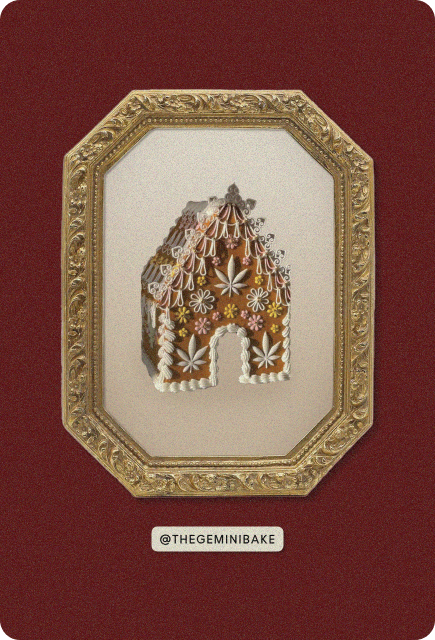 An elegant and ornate gingerbread house with delicate royal icing filigree and elevated architectural details, crafted by @thegeminibake.