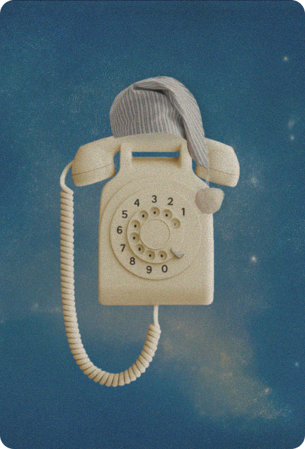 Vintage phone wearing a sleep cap against a night sky, representing putting devices away before bedtime.