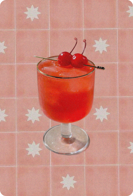 Bright red cherry mocktail in a glass with ice and cherry garnish, representing a sweet Shirlier Temple made with Wims.