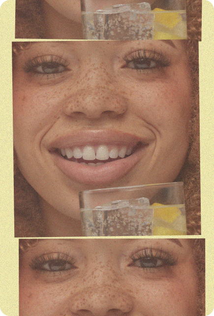 Smiling person holding a sparkling citrus drink, representing relaxed and social moments with Wims.