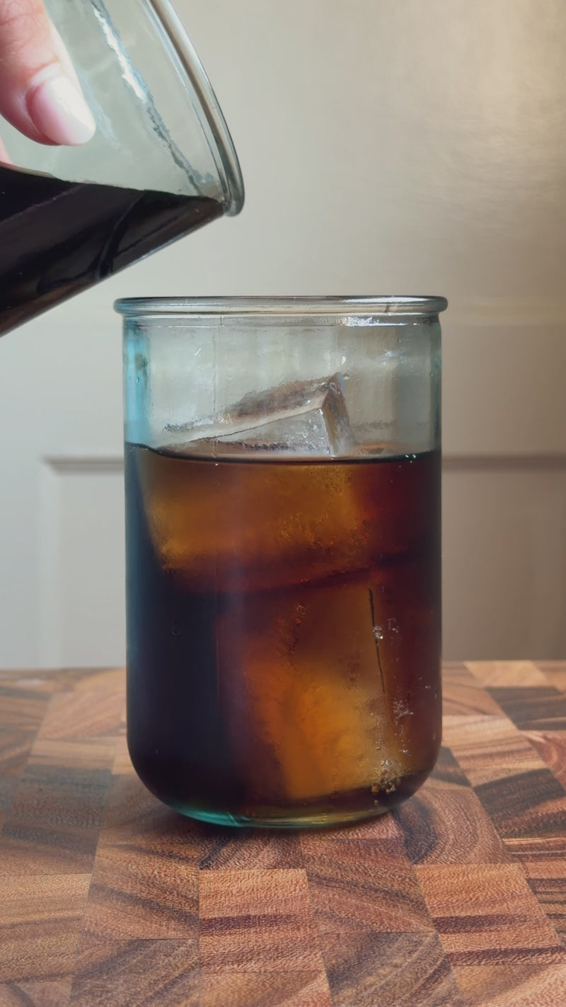 Espresso and Unflavored Wims Pocket-Tonic™ being added to Diet Coke over ice.